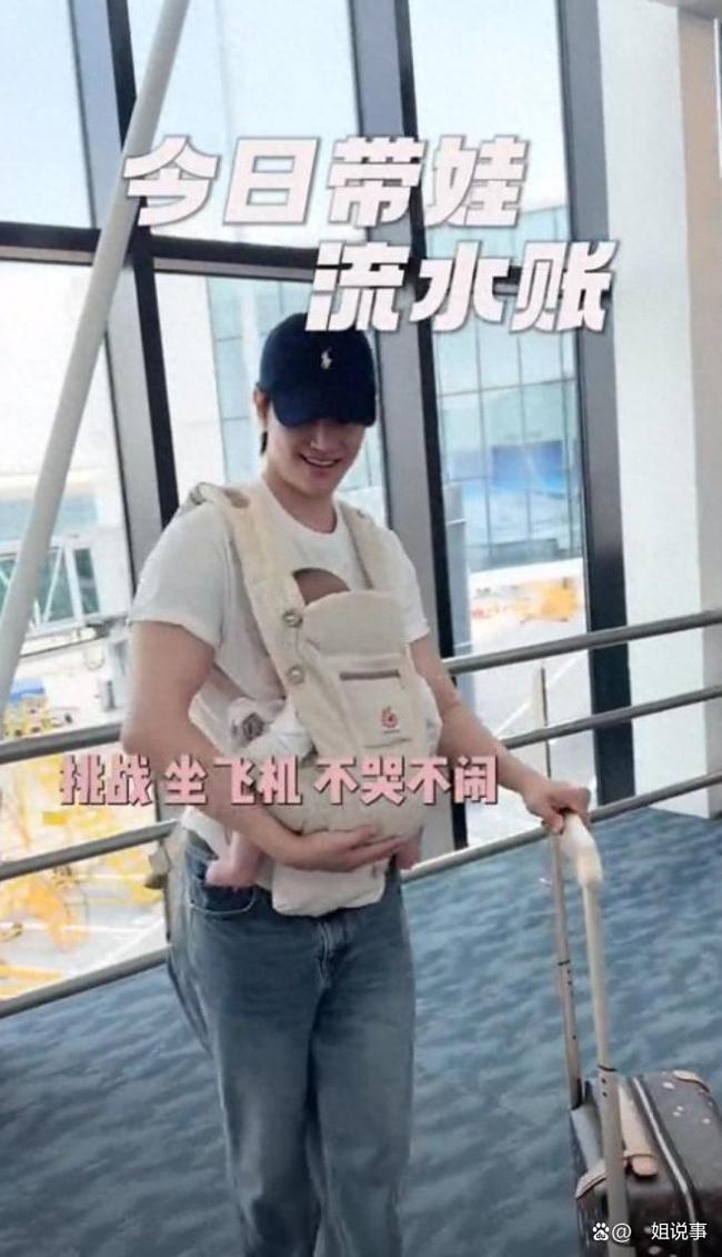 张檬机场头盖布给儿子喂母乳