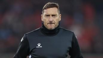 托蒂与斯帕莱蒂重聚合拍广告，象征着二人冰释前嫌